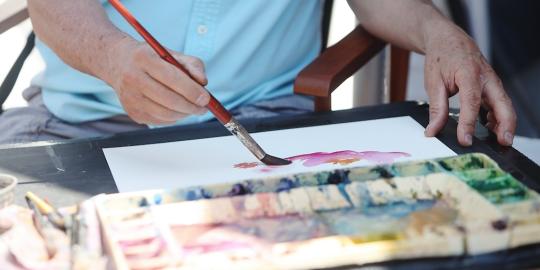 Person in Blue Shirt Arms only painting with water colors and brush